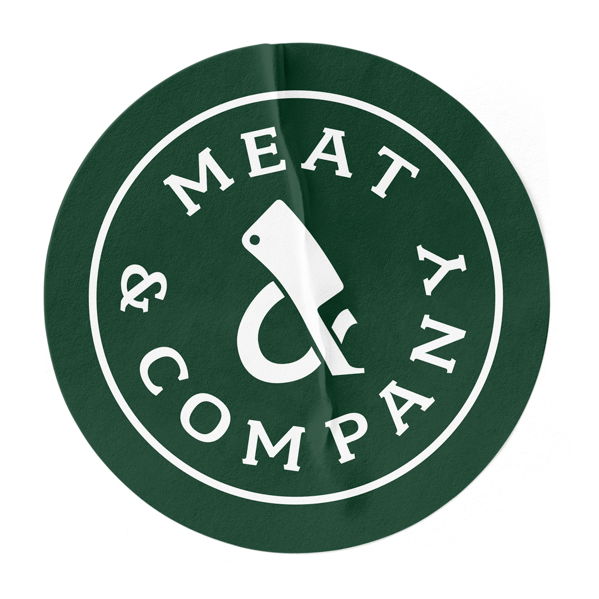 Green circular logo with a white meat cleaver graphic and the words "MEAT & COMPANY" around it.